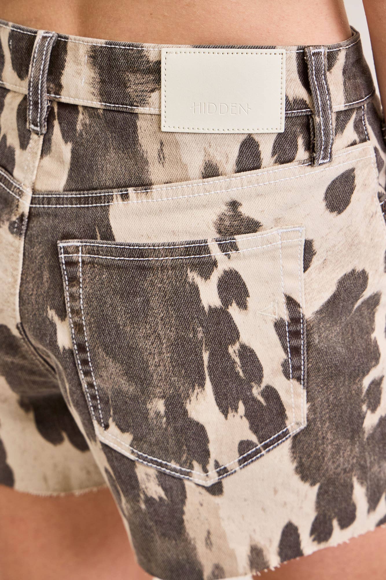 Cow Print Denim Short With Raw Hem